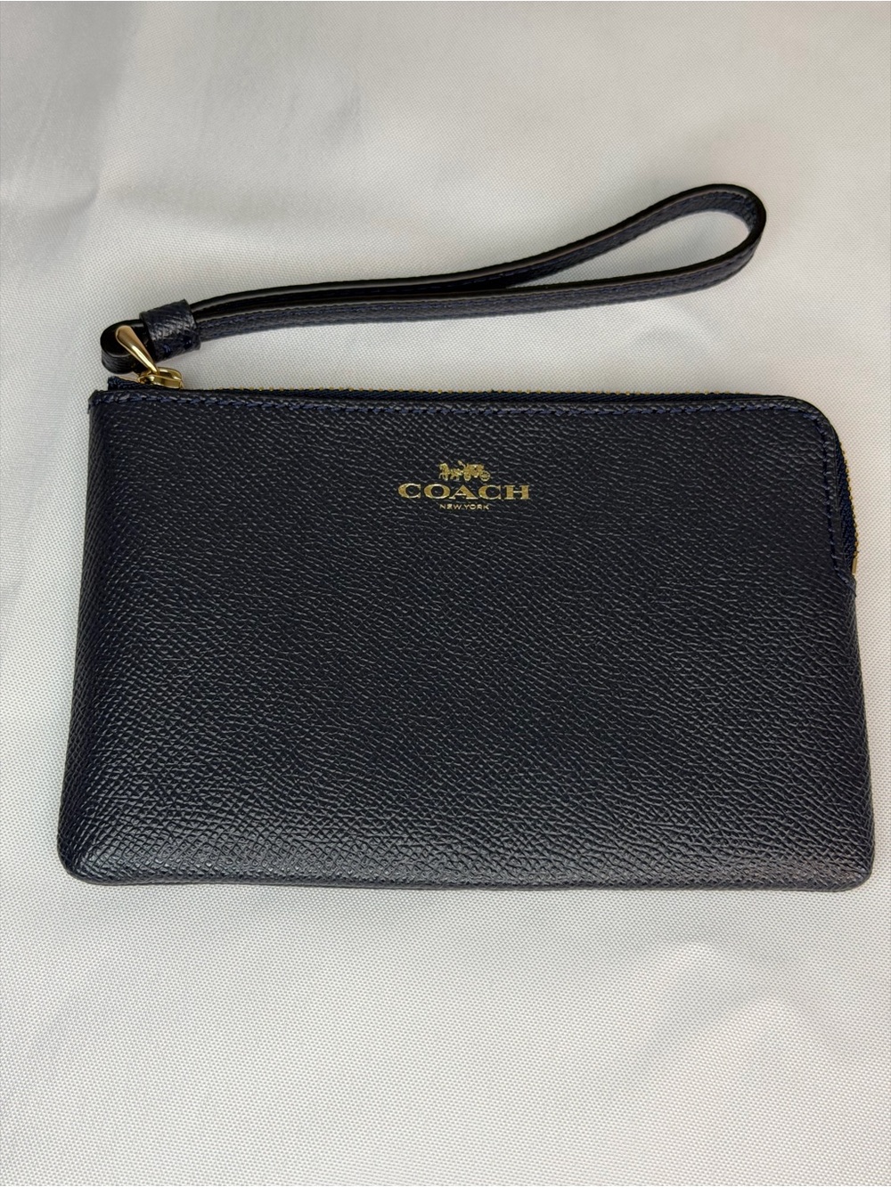Coach Navy Leather Wristlet with Gold Logo Accent